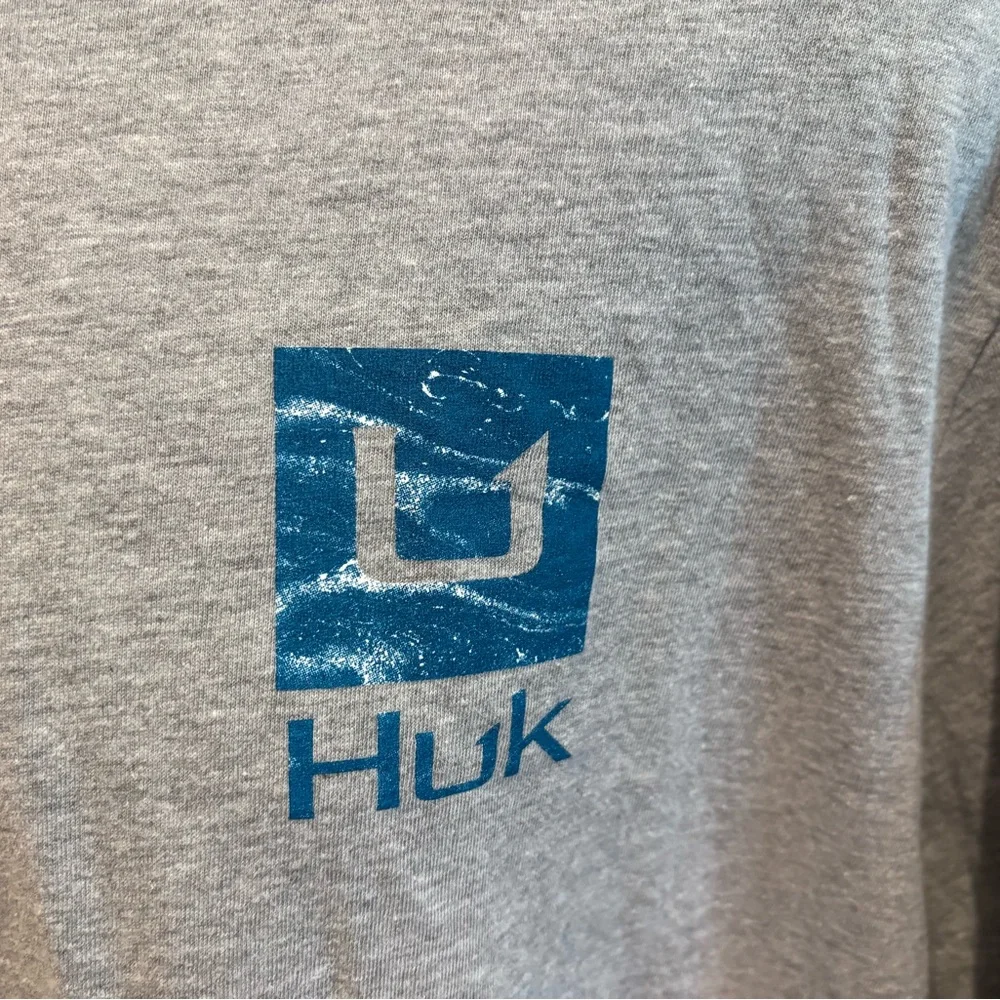 Huk men’s Outer Banks Angler t-shirt. Sharp blue print w/logos front/back/sleeve